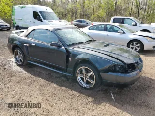 1999 Ford Mustang GT с VIN 1FAFP45X8XF133623, выставлен на аукционе Copart как лот 56319745 с пробегом 221 040 миль миль и Списание • Salvage title. История ставок и продаж доступна на DreamBid. Изображение 4.