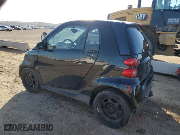 2009 Smart fortwo Pure with VIN WMEEJ31X89K287722, listed as a Copart auction lot 54266035 with 203,261 mi miles and Salvage Title. Bid and sale history available at carsss.com. Image 2.