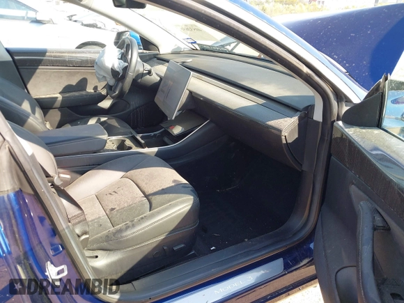 2018 Tesla Model 3 Long Range Battery with VIN 5YJ3E1EA6JF027065, listed as a IAAI auction lot 40532631 with 55,316 mi miles. Bid and sale history available at carsss.com. Image 5.