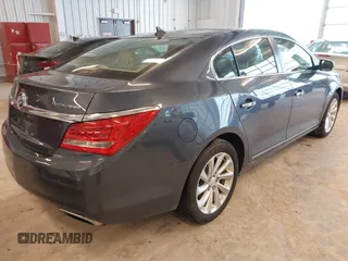 2014 Buick LaCrosse Leather with VIN 1G4GB5G39EF132695, listed as a IAAI auction lot 41728596 with 124,639 mi miles and . Bid and sale history available at DreamBid. Image 4.