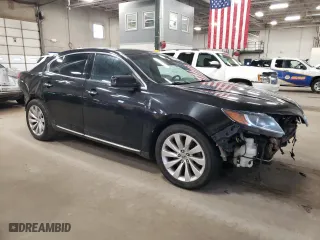 2014 Lincoln MKS with VIN 1LNHL9EK4EG606050, listed as a Copart auction lot 53412495 with 213,371 mi miles and Clean Title. Bid and sale history available at carsss.com. Image 4.