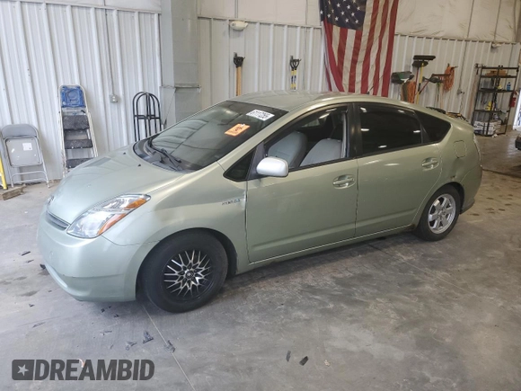2007 Toyota Prius z VIN JTDKB20U577556730, wystawiony jako Copart lot #61117255 z przebiegiem Nie podano mil oraz Nie do naprawy • Non repairable. Historia ofert i sprzedaży dostępna na DreamBid. Obrazek 1.