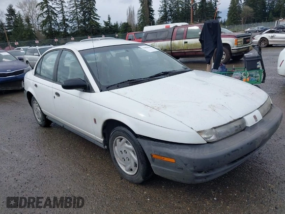 1997 Saturn SL with VIN 1G8ZF5283VZ400170, listed as a IAAI auction lot 41884490 with 171,635 mi miles. Bid and sale history available at carsss.com. Image 1.