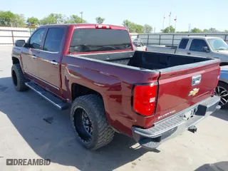 2014 Chevrolet Silverado 1500 LT with VIN 3GCPCRECXEG410417, listed as a IAAI auction lot 41854194 with 128,352 mi miles. Bid and sale history available at carsss.com. Image 3.