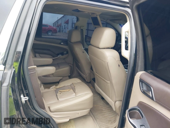 2017 Chevrolet Tahoe LT with VIN 1GNSCBKCXHR342170, listed as a IAAI auction lot 42137766 with 76,854 mi miles and . Bid and sale history available at DreamBid. Image 8.