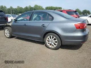 2014 Volkswagen Jetta SE z VIN 3VWD17AJ8EM405443, wystawiony jako Copart lot #59843445 z przebiegiem 156 331 mil mil oraz Szkoda całkowita • Salvage title. Historia ofert i sprzedaży dostępna na DreamBid. Obrazek 2.