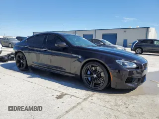 2014 BMW M6 z VIN WBS6C9C51EDV73883, wystawiony jako Copart lot #76395574 z przebiegiem 57 995 mil mil oraz Czysty tytuł • Clean title. Historia ofert i sprzedaży dostępna na DreamBid. Obrazek 4.