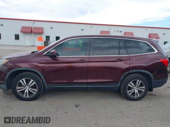 2016 Honda Pilot EX-L with VIN 5FNYF5H58GB026209, listed as a IAAI auction lot 41333088 with 129,484 mi miles and . Bid and sale history available at DreamBid. Image 14.