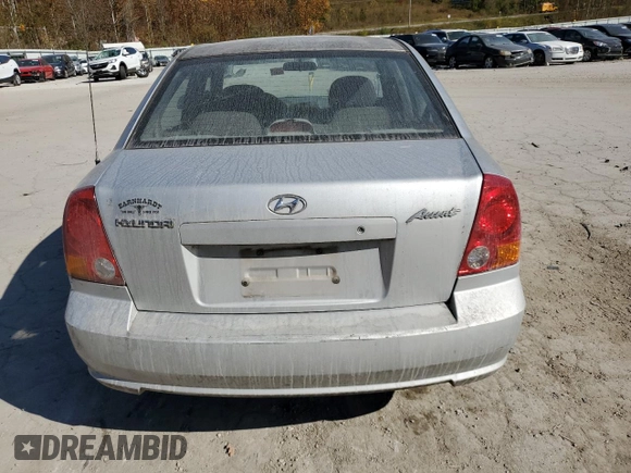2005 Hyundai Accent GLS with VIN KMHCG45C75U638812, listed as a Copart auction lot 77968234 with 130,815 mi miles and Salvage Title. Bid and sale history available at carsss.com. Image 6.
