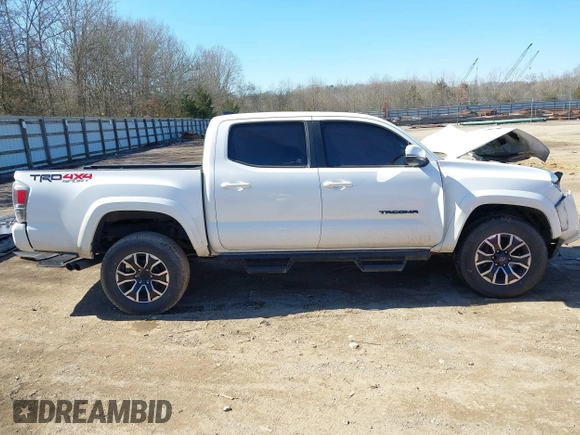 2022 Toyota Tacoma SR with VIN 3TMCZ5AN4NM470000, listed as a IAAI auction lot 41629818 with 78,138 mi miles and . Bid and sale history available at DreamBid. Image 12.