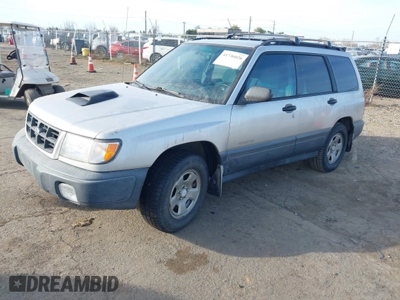 2000 Subaru Forester L with VIN JF1SF6355YH721788, listed as a IAAI auction lot 41736026 with 305,157 mi miles. Bid and sale history available at carsss.com. Image 2.
