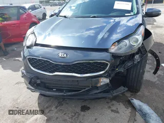 2020 Kia Sportage LX with VIN KNDPM3AC3L7713581, listed as a IAAI auction lot 40255286 with 90,221 mi miles and . Bid and sale history available at carsss.com. Image 6.