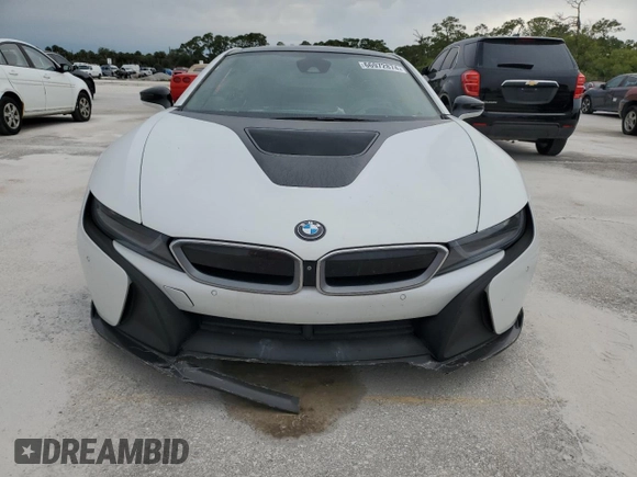 2015 BMW i8 z VIN WBY2Z2C56FV392042, wystawiony jako Copart lot #66972874 z przebiegiem Nie podano mil oraz Szkoda całkowita • Salvage title. Historia ofert i sprzedaży dostępna na DreamBid. Obrazek 5.