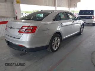 2014 Ford Taurus SEL z VIN 1FAHP2E82EG139690, wystawiony jako IAAI lot #42312483 z przebiegiem 170 029 mil mil oraz . Historia ofert i sprzedaży dostępna na DreamBid. Obrazek 4.
