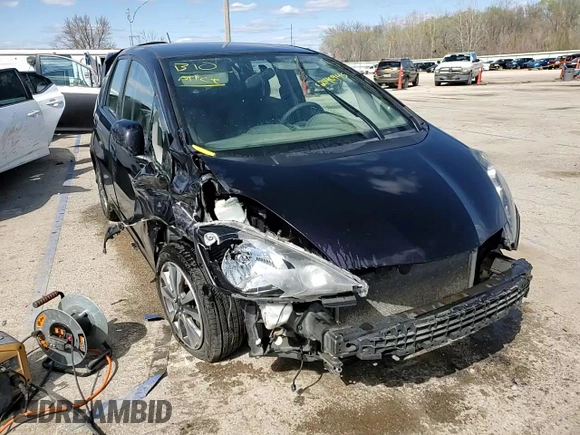 2013 Honda Fit Sport z VIN JHMGE8H68DC053863, wystawiony jako Copart lot #52140945 z przebiegiem Nie podano mil oraz Szkoda całkowita • Salvage title. Historia ofert i sprzedaży dostępna na DreamBid. Obrazek 14.