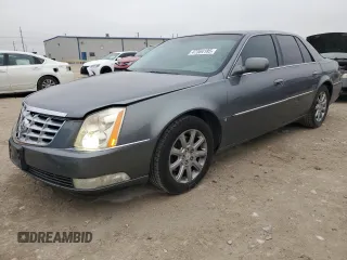 2008 Cadillac DTS 1SA z VIN 1G6KD57Y08U142796, wystawiony jako Copart lot #47364185 z przebiegiem 128 530 mil mil oraz Szkody całkowita. Historia ofert i sprzedaży dostępna na DreamBid. Obrazek 1.