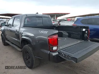 2022 Toyota Tacoma SR with VIN 3TYAX5GN8NT066318, listed as a IAAI auction lot 41739981 with 50,186 mi miles and . Bid and sale history available at DreamBid. Image 3.