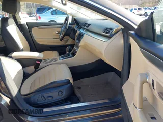 2013 Volkswagen CC Lux with VIN WVWRP7ANXDE522469, listed as a IAAI auction lot 41413025 with 115,117 mi miles. Bid and sale history available at carsss.com. Image 5.