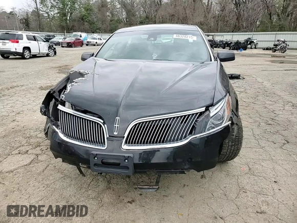 2013 Lincoln MKS z VIN 1LNHL9DKXDG612368, wystawiony jako Copart lot #48328215 z przebiegiem 108 788 mil mil oraz Szkoda całkowita • Salvage title. Historia ofert i sprzedaży dostępna na DreamBid. Obrazek 11.