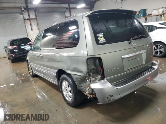 2005 Kia Sedona LX with VIN KNDUP132256690810, listed as a Copart auction lot 50096505 with 88,003 mi miles and Salvage Title. Bid and sale history available at carsss.com. Image 2.