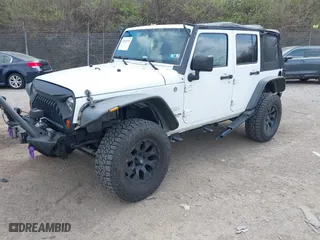 2012 Jeep Wrangler Unlimited Sahara with VIN 1C4BJWEG9CL220965, listed as a IAAI auction lot 41902295 with 120,492 mi miles. Bid and sale history available at carsss.com. Image 18.