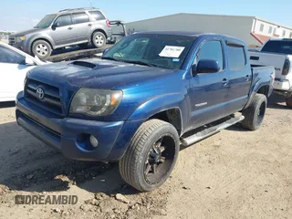 2008 Toyota Tacoma PreRunner with VIN 3TMJU62N78M062878, listed as a IAAI auction lot 41781780 with 247,276 mi miles. Bid and sale history available at carsss.com. Image 2.
