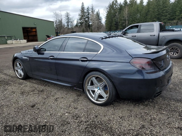 2013 BMW 6 Series 650i with VIN WBA6B2C50DD128242, listed as a Copart auction lot 44441885 with 107,960 mi miles and Salvage Title. Bid and sale history available at DreamBid. Image 2.