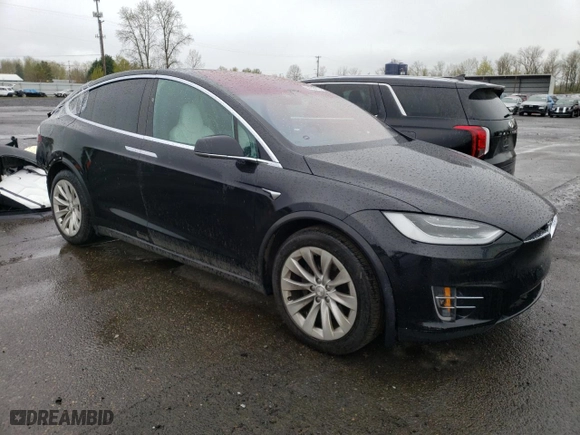 2018 Tesla Model X 75D with VIN 5YJXCBE20JF119875, listed as a Copart auction lot 50772175 with 48,805 mi miles and Salvage Title. Bid and sale history available at carsss.com. Image 4.