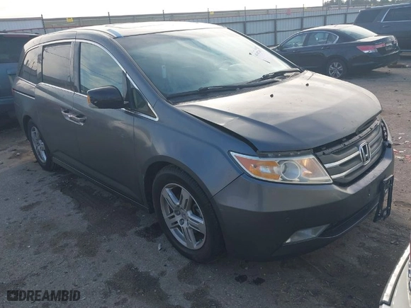 2012 Honda Odyssey Touring with VIN 5FNRL5H99CB033289, listed as a IAAI auction lot 41407301 with NaN miles. Bid and sale history available at carsss.com. Image 1.