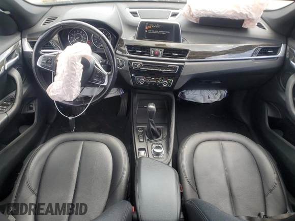 2017 BMW X1 xDrive28i with VIN WBXHT3C39H5F81200, listed as a Copart auction lot 55304485 with 88,948 mi miles and Salvage Title. Bid and sale history available at DreamBid. Image 8.