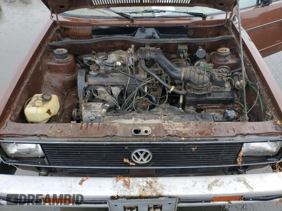 1979 Volkswagen Rabbit z VIN 1793863402, wystawiony jako Copart lot #79580954 z przebiegiem 82 349 mil mil oraz Czysty tytuł • Clean title. Historia ofert i sprzedaży dostępna na DreamBid. Obrazek 11.