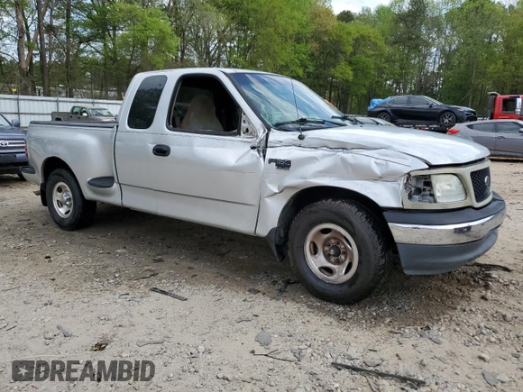 2000 Ford F-150 XL with VIN 1FTRX07W3YKA40036, listed as a Copart auction lot 51795085 with Not provided miles and Salvage title. Bid and sale history available at DreamBid. Image 4.