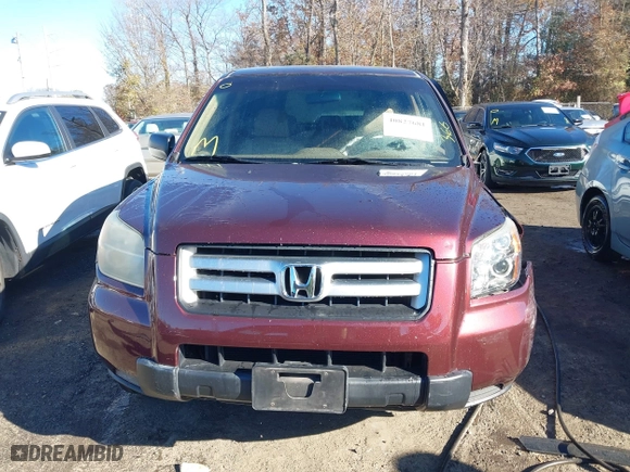 2007 Honda Pilot LX with VIN 2HKYF18167H510970, listed as a IAAI auction lot 40827681 with 119,011 mi miles. Bid and sale history available at carsss.com. Image 12.
