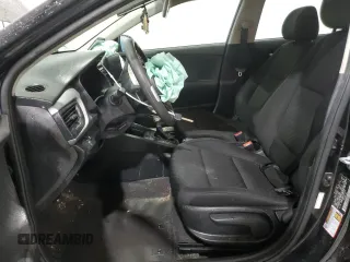 2023 Kia Rio LX with VIN 3KPA24AD0PE615673, listed as a Copart auction lot 70046634 with 55,906 mi miles and Salvage Title. Bid and sale history available at DreamBid. Image 7.