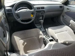 1999 Chevrolet Prizm z VIN 1Y1SK5285XZ408188, wystawiony jako Copart lot #76388964 z przebiegiem 114 085 mil mil oraz Szkoda całkowita • Salvage title. Historia ofert i sprzedaży dostępna na DreamBid. Obrazek 8.