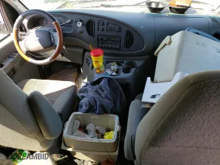 2004 Ford Econoline Wagon XL with VIN 1FBSS31LX4HB16895, listed as a Copart auction lot 65115554 with 48,980 mi miles and Salvage Title. Bid and sale history available at carsss.com. Image 8.