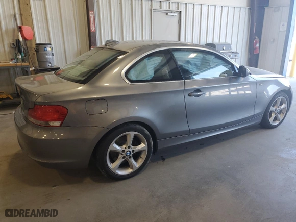 2010 BMW 1 Series 128i with VIN WBAUP7C58AVK77512, listed as a Copart auction lot 68623084 with 111,092 mi miles and Salvage Title. Bid and sale history available at carsss.com. Image 3.