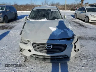 2016 Mazda CX-3 Touring with VIN JM1DKBC71G0115328, listed as a Copart auction lot 43467785 with 138,742 mi miles and Salvage Title. Bid and sale history available at DreamBid. Image 5.