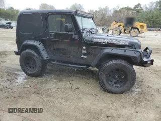 2004 Jeep Wrangler Sahara with VIN 1J4FA59SX4P722608, listed as a Copart auction lot 51223345 with 146,600 mi miles and Salvage title. Bid and sale history available at DreamBid. Image 4.