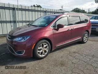 2020 Chrysler Pacifica Touring L with VIN 2C4RC1BG4LR115340, listed as a Copart auction lot 60921565 with 136,594 mi miles and Salvage title. Bid and sale history available at DreamBid. Image 1.