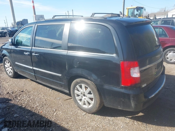2012 Chrysler Town & Country Touring L with VIN 2C4RC1CG4CR163287, listed as a IAAI auction lot 41924835 with 211,461 mi miles and . Bid and sale history available at carsss.com. Image 3.