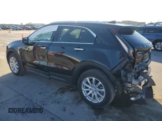 2023 Cadillac XT4 FWD Luxury z VIN 1GYAZAR42PF102696, wystawiony jako Copart lot #85540204 z przebiegiem 1 903 mil mil oraz Szkoda całkowita • Salvage title. Historia ofert i sprzedaży dostępna na DreamBid. Obrazek 2.