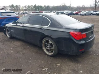 2011 BMW 7 Series 750Li with VIN WBAKB8C58BCY64706, listed as a IAAI auction lot 42022941 with 145,457 mi miles. Bid and sale history available at carsss.com. Image 3.