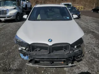 2020 BMW X1 xDrive28i with VIN WBXJG9C00L5P60455, listed as a Copart auction lot 52353875 with 77,709 mi miles and Salvage Title. Bid and sale history available at carsss.com. Image 5.