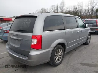 2014 Chrysler Town & Country Touring-L 30th Anniversary with VIN 2C4RC1CG6ER407816, listed as a IAAI auction lot 41689312 with 196,862 mi miles. Bid and sale history available at carsss.com. Image 4.