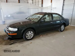 1999 Nissan Maxima GXE z VIN JN1CA21D0XT808755, wystawiony jako Copart lot #49693685 z przebiegiem 63 389 mil mil oraz Szkoda całkowita • Salvage title. Historia ofert i sprzedaży dostępna na DreamBid. Obrazek 1.