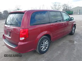 2014 Dodge Grand Caravan SE with VIN 2C4RDGBG6ER187868, listed as a IAAI auction lot 41949644 with 156,937 mi miles and . Bid and sale history available at DreamBid. Image 4.