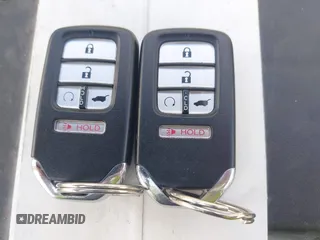 2019 Honda Pilot EX-L with VIN 5FNYF6H52KB035504, listed as a IAAI auction lot 42642735 with 54,736 mi miles and . Bid and sale history available at DreamBid. Image 11.