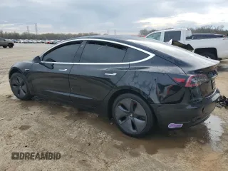 2019 Tesla Model 3 Mid Range z VIN 5YJ3E1EA8KF297299, wystawiony jako Copart lot #47935394 z przebiegiem 117 644 mil mil oraz Szkoda całkowita • Salvage title. Historia ofert i sprzedaży dostępna na DreamBid. Obrazek 2.