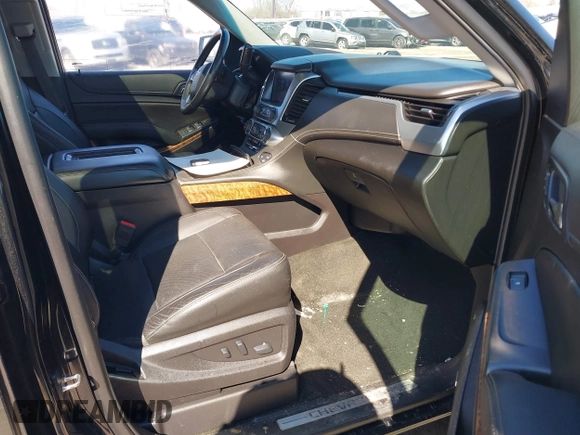 2017 Chevrolet Suburban Premier with VIN 1GNSKJKC8HR285321, listed as a IAAI auction lot 41796659 with 128,113 mi miles and . Bid and sale history available at DreamBid. Image 5.